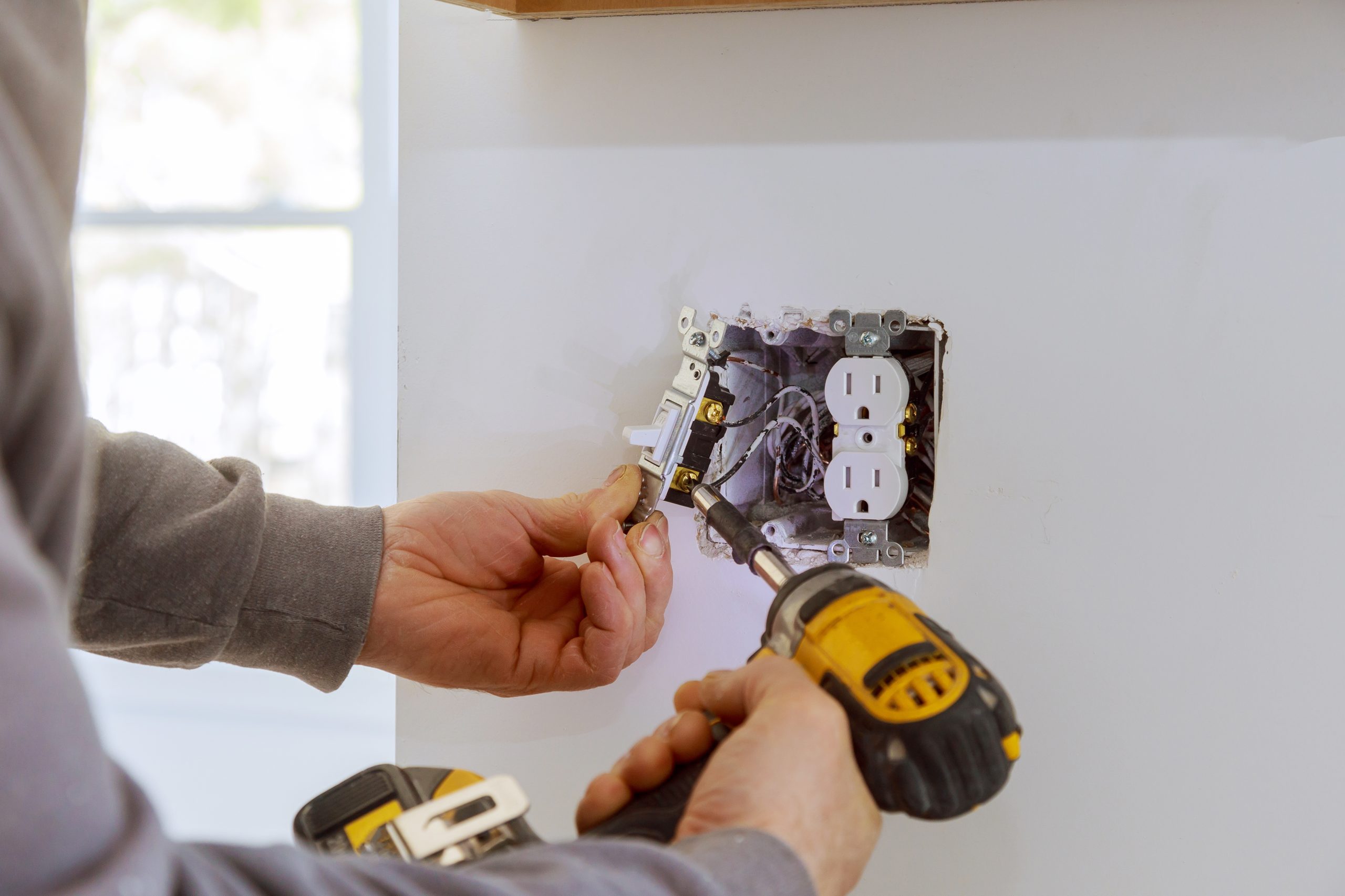 Work on installing electrical outlets.